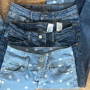 3 Gilts Jeans. 1 is Vigoss Floral Classic Blue Jeans other 2 are Walmart brand